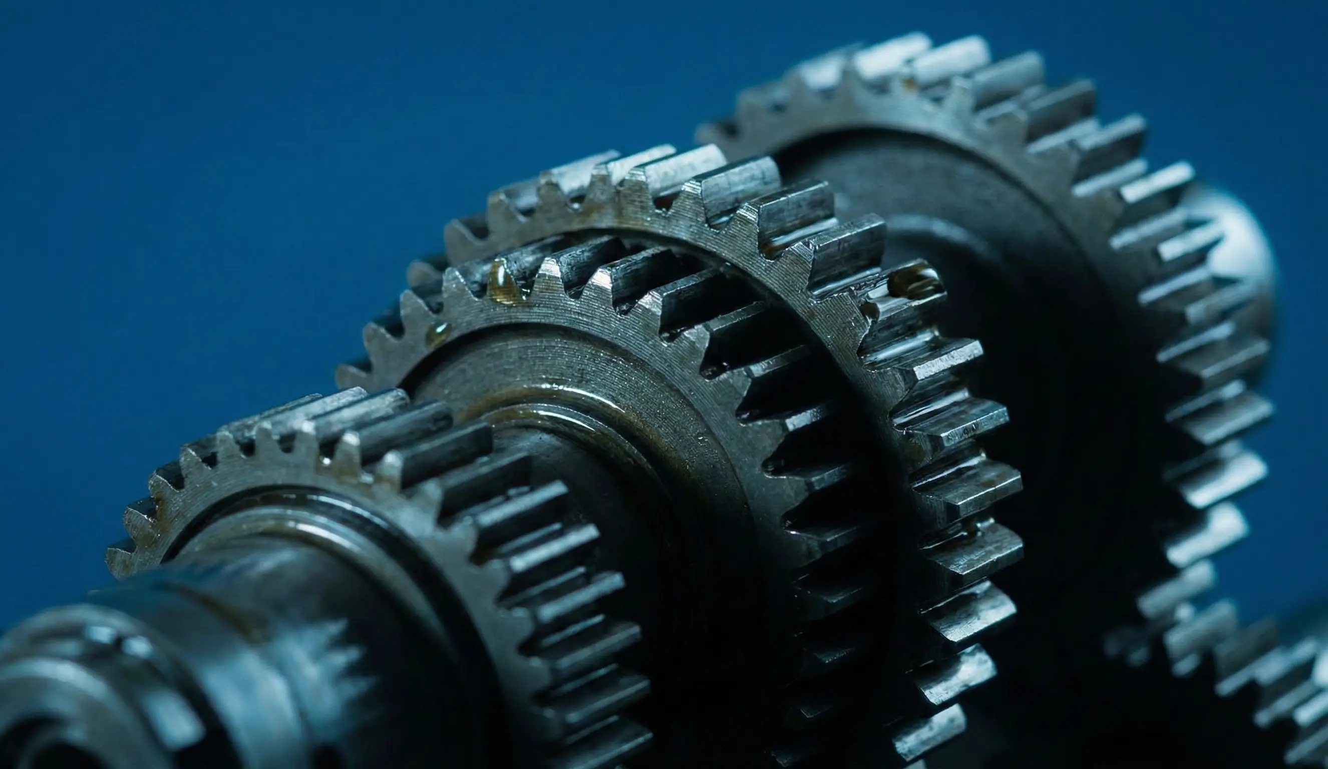 Tractor with hay bales in a vast field